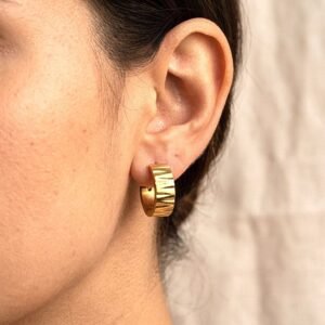 Texture that catches the light. A silhouette that goes with everything. Solara Facet Hoops reinvent the classic gold hoop with a sculpted, faceted finish that adds dimension without adding excess. Made for the woman who wants her everyday jewellery to feel just a little more considered. Demi-Fine · Anti-Tarnish · Hypoallergenic · High-Grade Metal